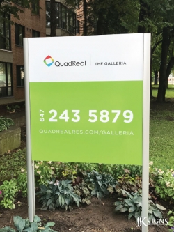 Post and panel signs for QuadReal in Toronto