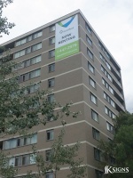 Grand Format Banner For Quadreal Installed In Toronto